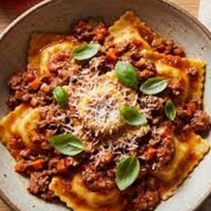 Ravioles Jamón y Mozzarella c/bolognesa